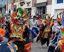 Image of colourful parade in the city centre