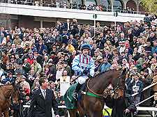 Further picture of crowds at the racecourse