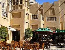 Image of outdoor cafe tables in the sunshine