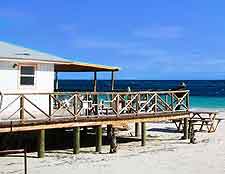 Image of beachfront dining tables