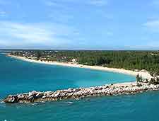 Tropical beachfront, complete with white sand