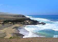 Image of volcanic black sandy beach of Fuerteventura