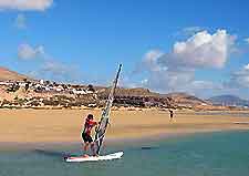 Image of a windsurfer off the coast of a Fuerteventura beach