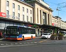 Central view of bus and cars