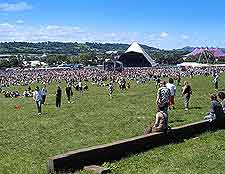 Picture of crowds and Pyramid Stage at the Glasto Pop Festival