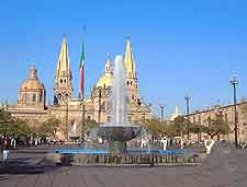 Summer picture of fountain and cathedral