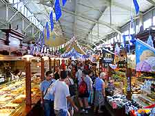 Photo showing people shopping at a local market