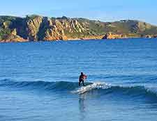 Picture of surfer at St. Brelade's Bay
