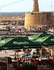 Picture of cafe tables in the summer sunshine