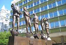 Photo of modern bronze sculptures in the city centre