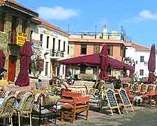 Photo of cafe tables in the sunshine