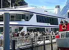 Picture of passengers boarding a local cruise boat at Milford Sound
