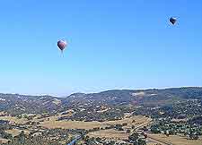 Scenic view of hot-air balloon flights