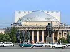 Picture of cars driving past the Opera House
