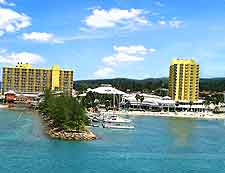 Waterfront photo showing resort and beachfront
