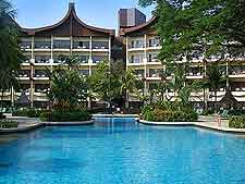 Picture of hotel with large outdoor swimming pool