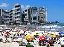 Photo of Guaruja's beach and summer sunbathers