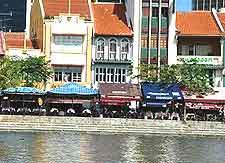 Photo of restaurants lining the riverside