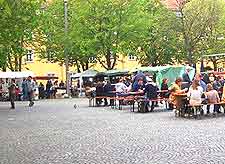 Photo of outdoor dining tables at local market in Stuttgart