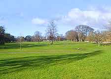 Photo of golf course close to the city