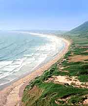 Image of the beautiful coastal stretch of Rhossili Bay, Gower Peninsula, Wales, UK