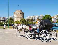 Photo of tourists enjoying a horse and carriage ride