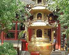 Photo of temple, showing ornate golden lantern