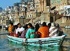 Photograph of boat on the Ganges, passing the various ghats