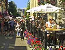 Photo of cafe and shoppers in the city centre
