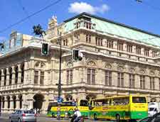 Picture of city bus driving past the Opera House