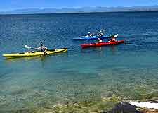 Photo of visitors kayaking in the summer