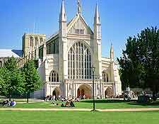 Summer photo of Winchester cathedral and surrounding gardens